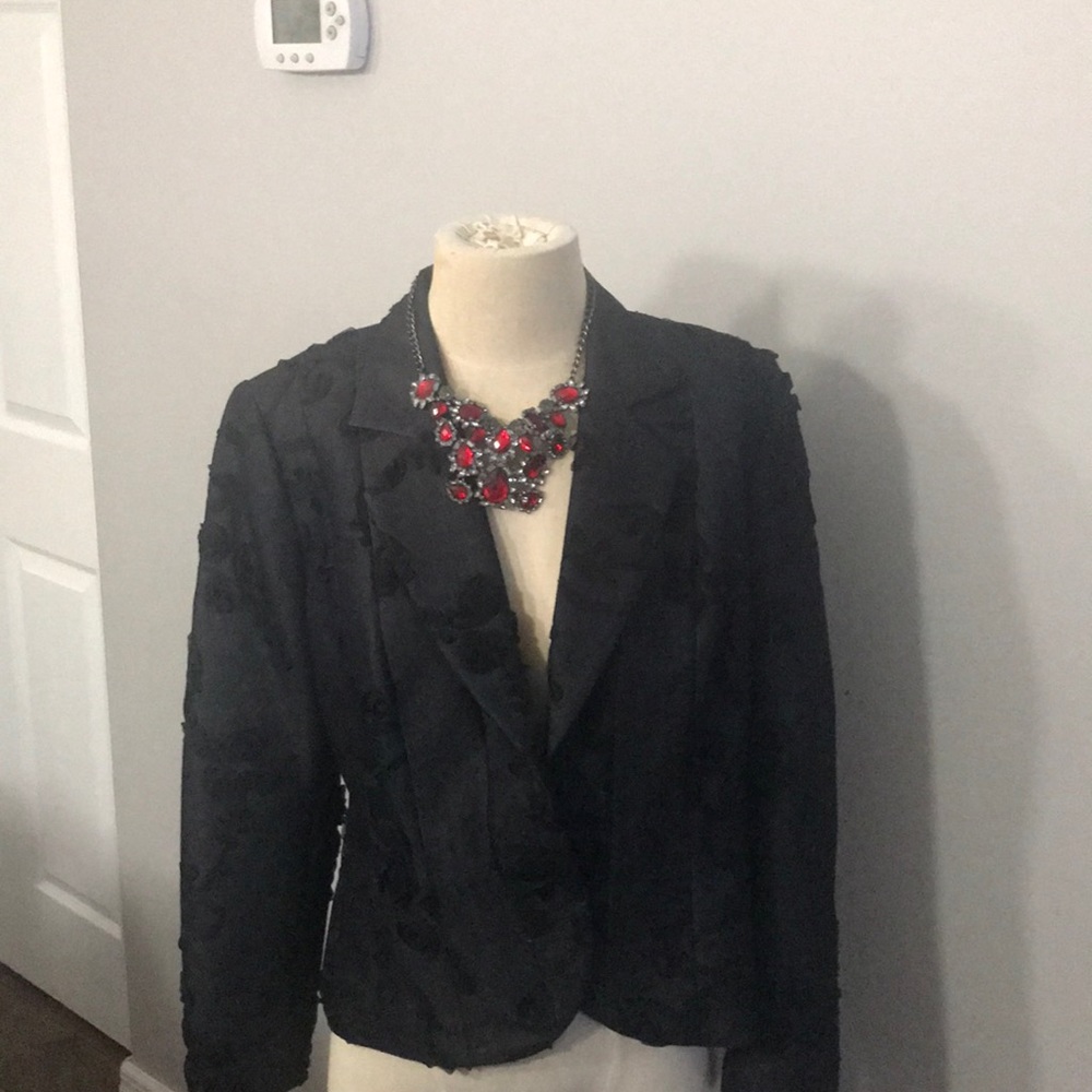 Black jacket with flower patterns